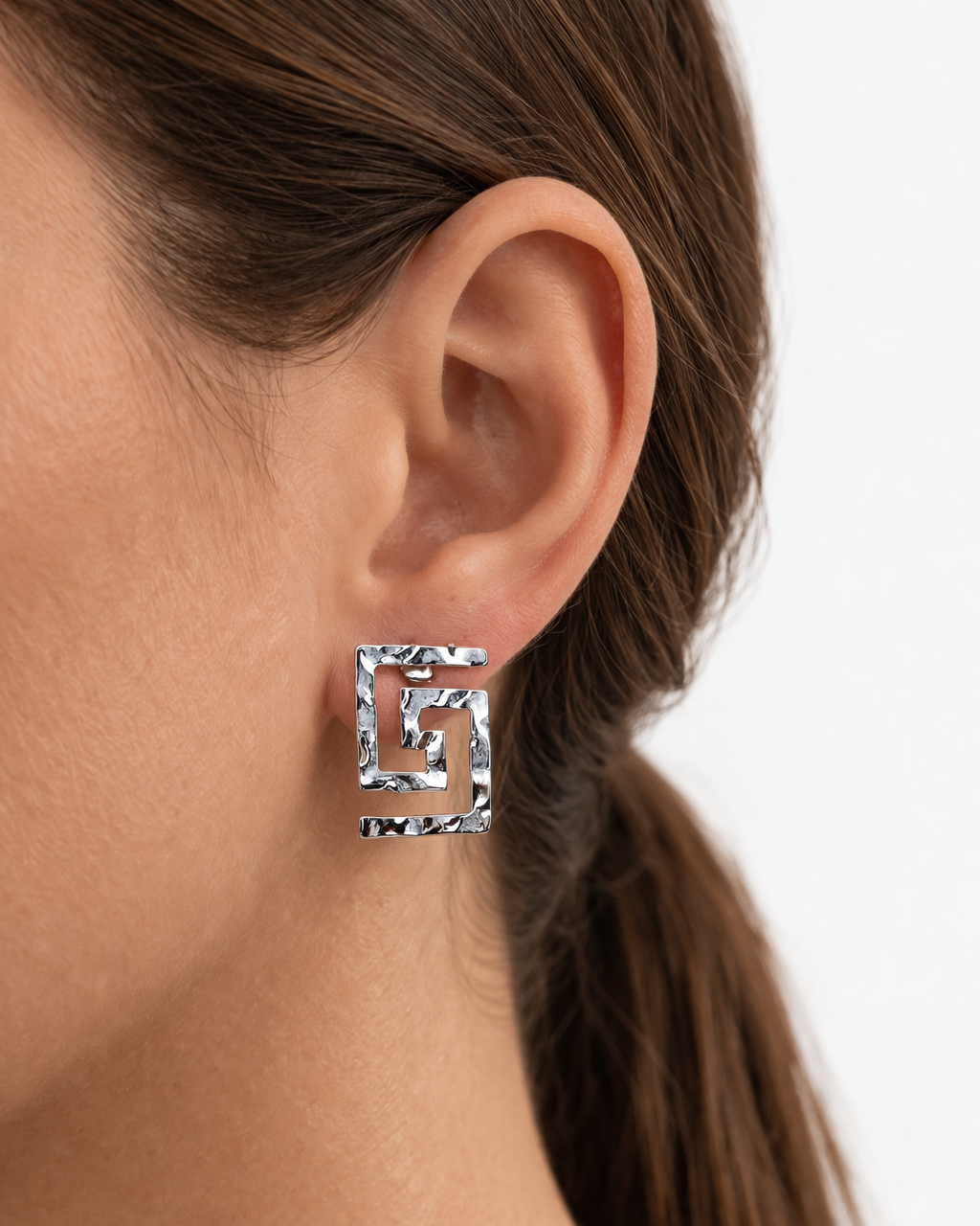 8714af30-d23d-4e22-b295-6d787cbac35d (1) Silver Meander Statement Earrings - Image 1
